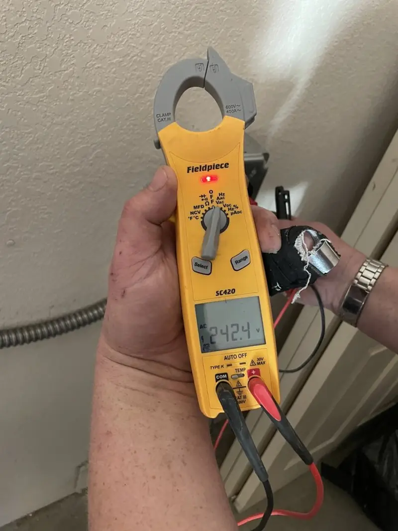 Voltage testing with clamp meter during Aluminum Wiring Replacement in Sturbridge